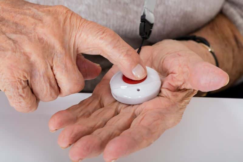Senior calling for emergency help with panic button